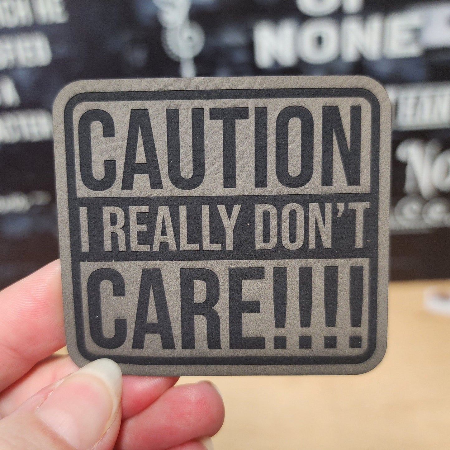 Caution I Don't Care (Grey) Engraved Leatherette Hat Patch - MR01 - LoneStar Adhesive