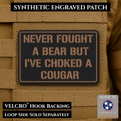 Front view of I’ve Choked A Cougar patch in black / copper