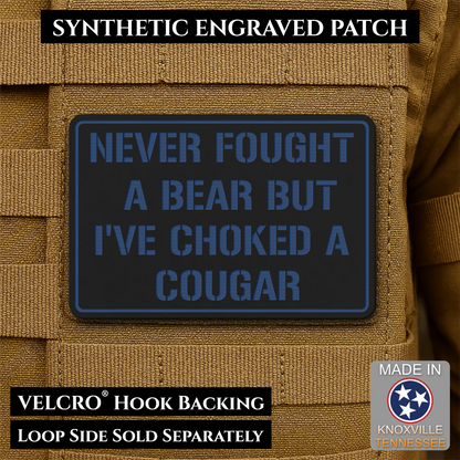 Front view of I’ve Choked A Cougar patch in black / blue