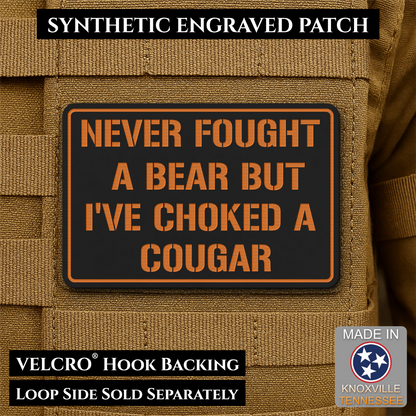 Front view of I’ve Choked A Cougar patch in black / orange