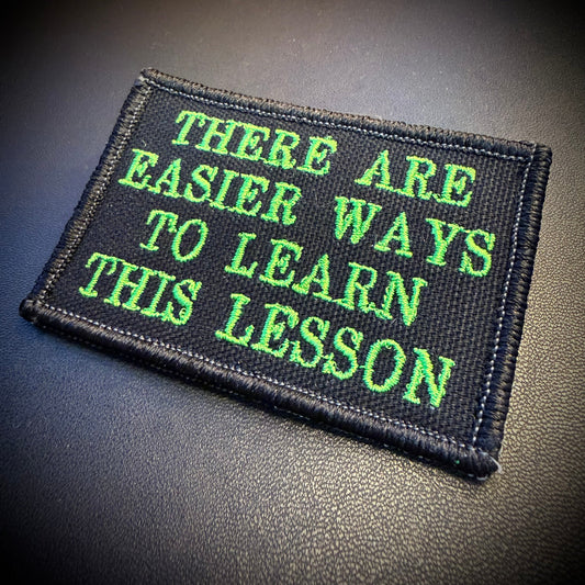 Hard Life Lessons Funny Embroidered Morale Patch, 2x3" | VELCRO® Brand Hook Backing