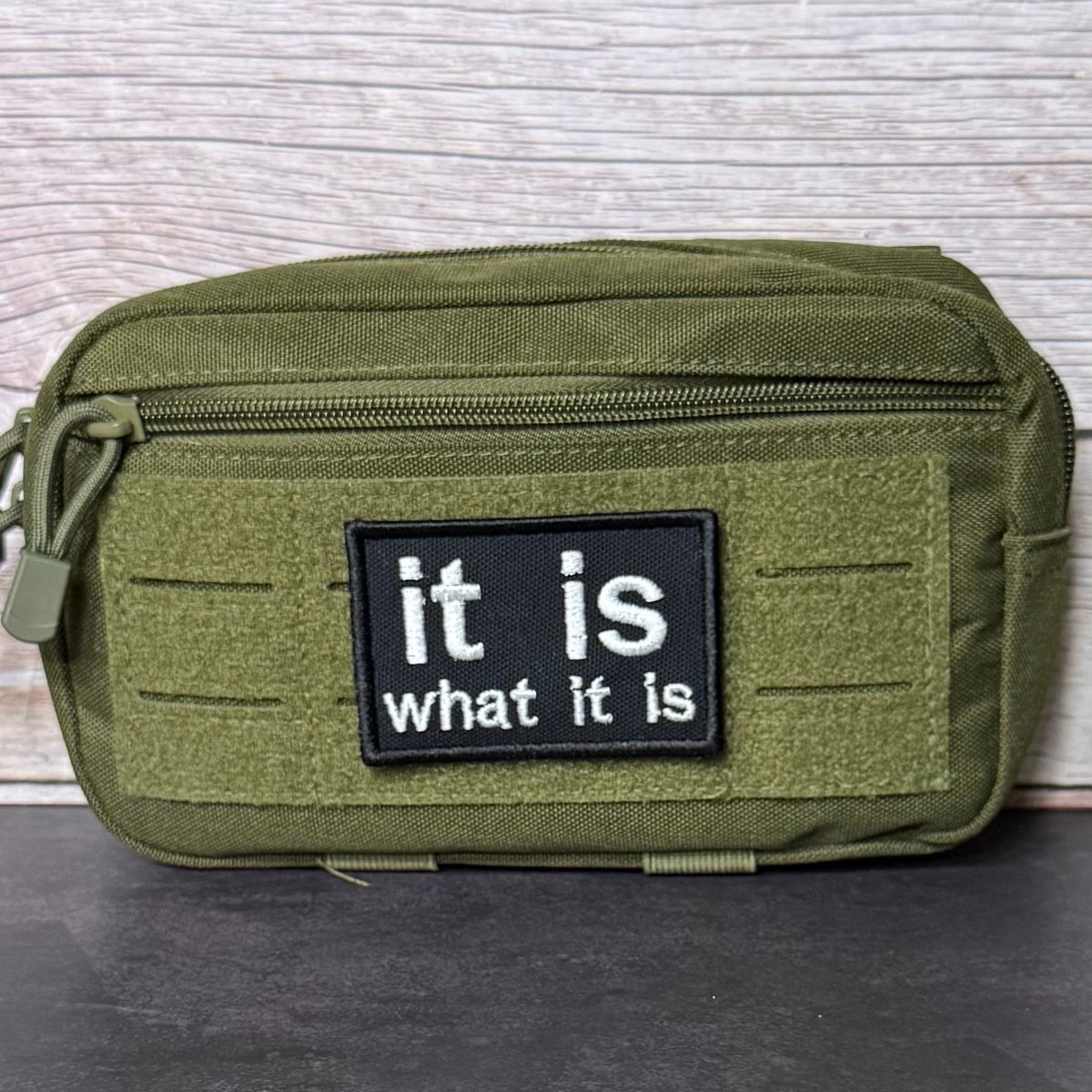 It Is What It Is Funny Morale Patch, 2x3" | Made in USA | VELCRO® Brand Hook Backing
