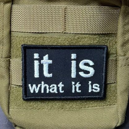 It Is What It Is Funny Morale Patch, 2x3" | Made in USA | VELCRO® Brand Hook Backing
