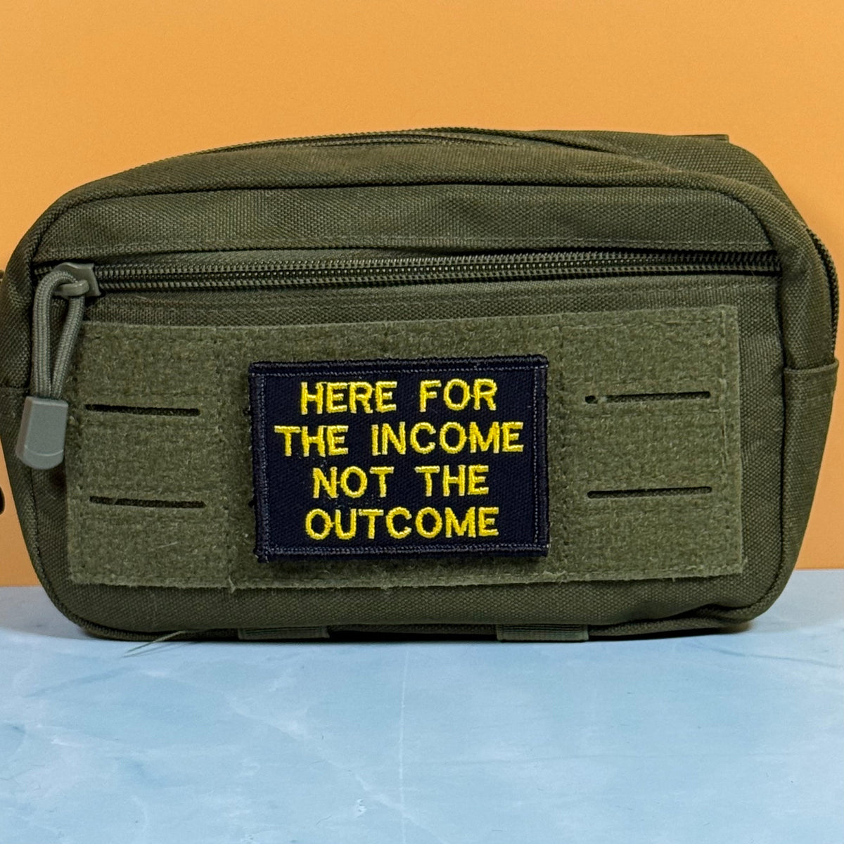 Here For The Income, Not The Outcome Funny Morale Patch, 2x3" | Made in USA | VELCRO® Brand Hook Backing