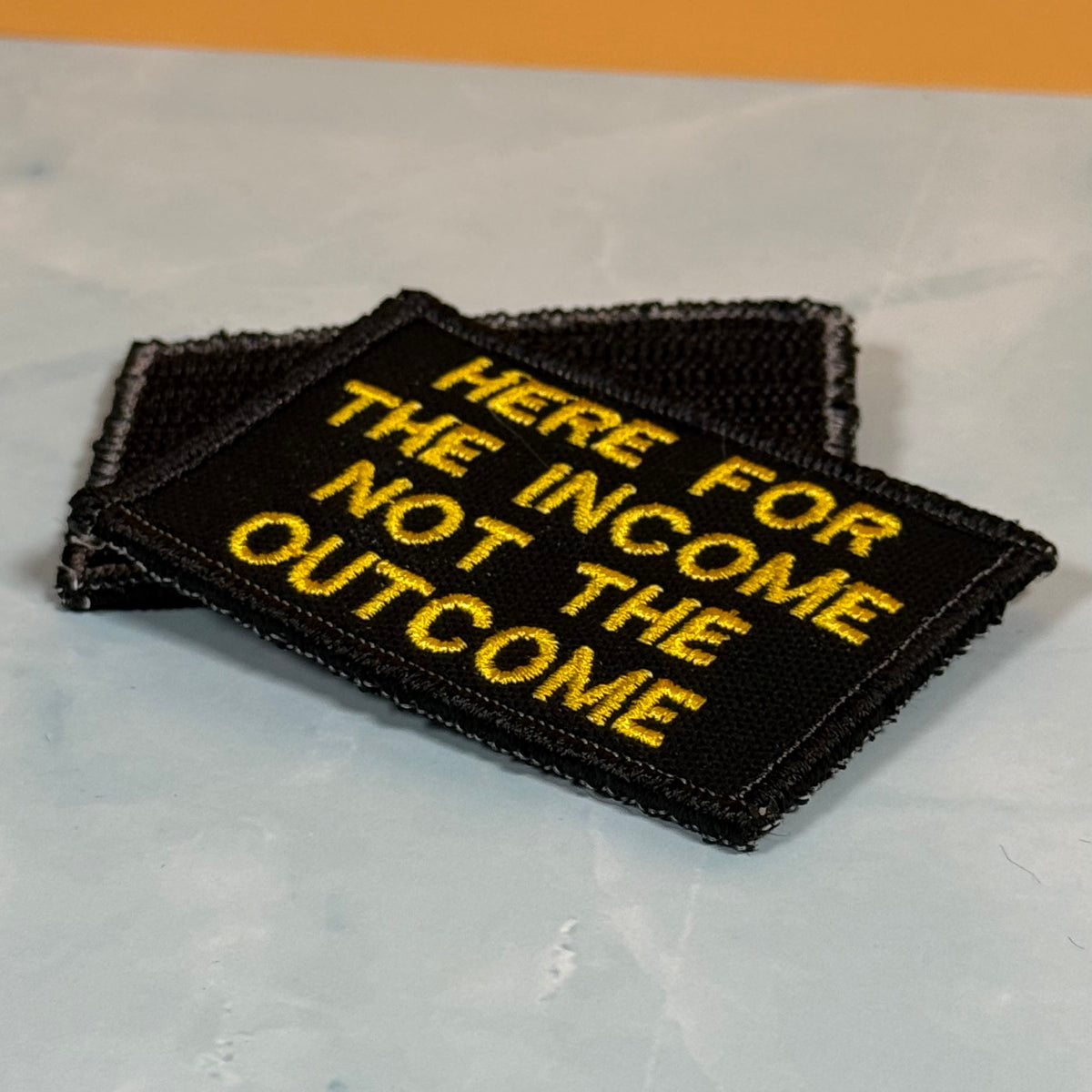 Here For The Income, Not The Outcome Funny Morale Patch, 2x3" | Made in USA | VELCRO® Brand Hook Backing