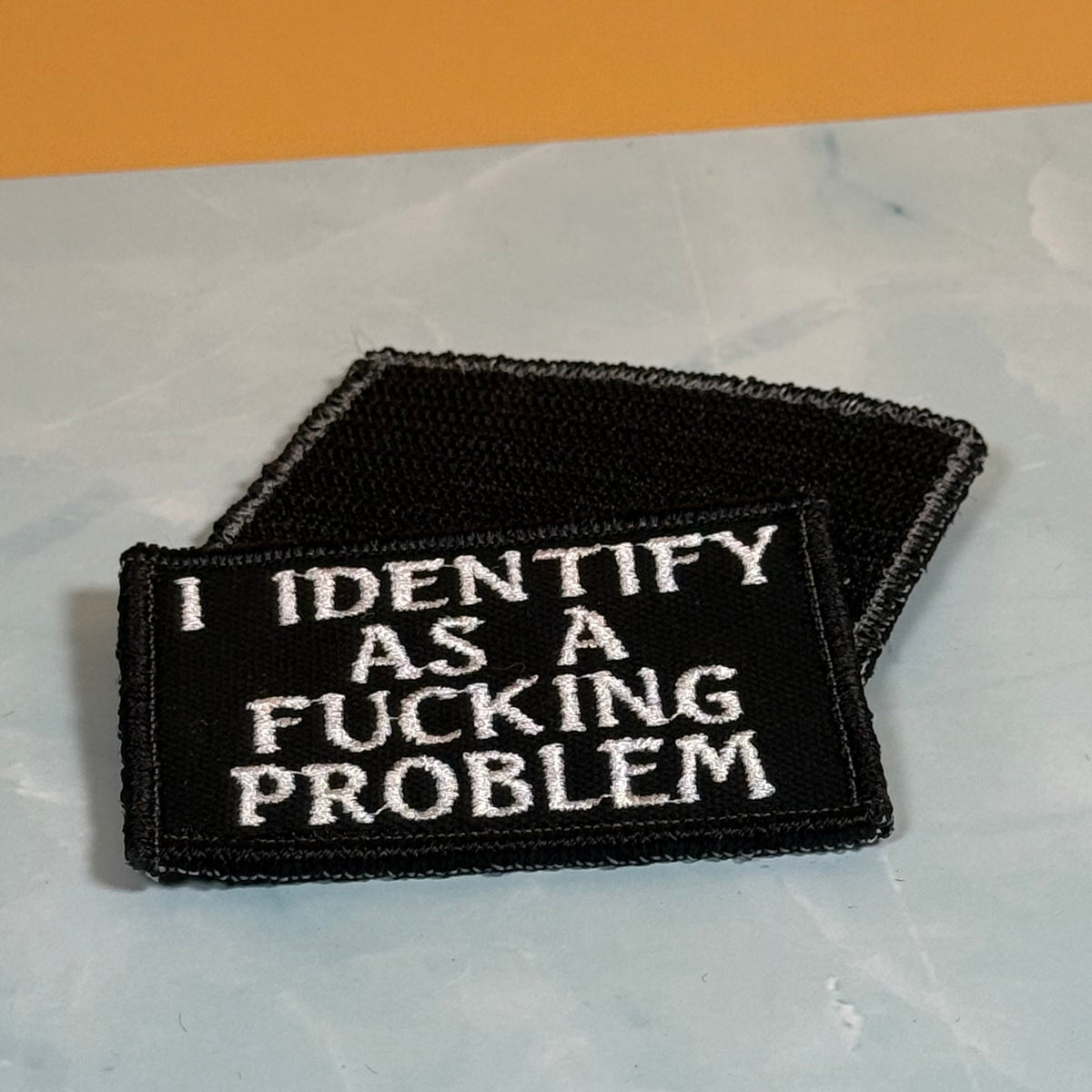I Identify As The Problem Funny Morale Patch, 2x3" | Made in USA | VELCRO® Brand Hook Backing
