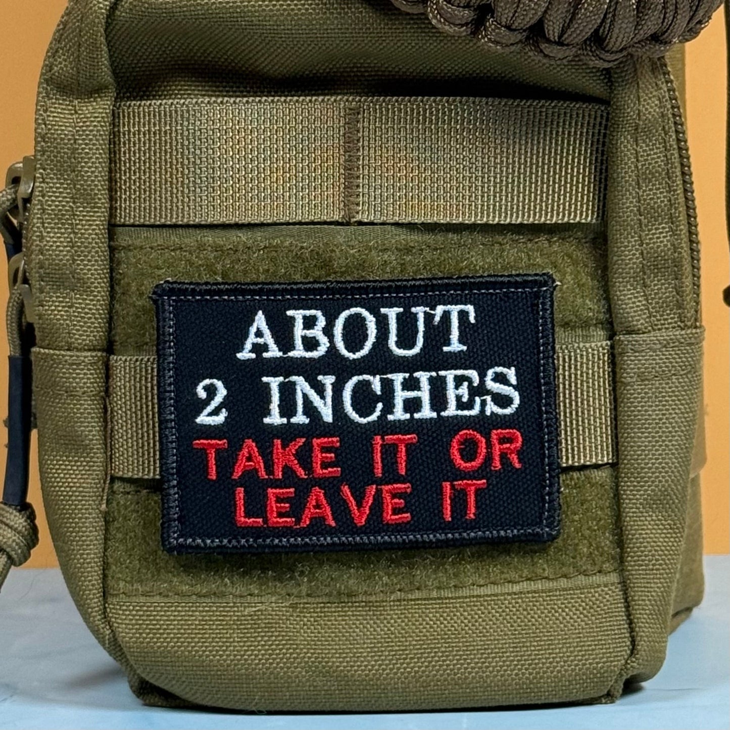 About 2 Inches Take It Or Leave It Funny Morale Patch, 2x3" | Made in USA | VELCRO® Brand Hook Backing