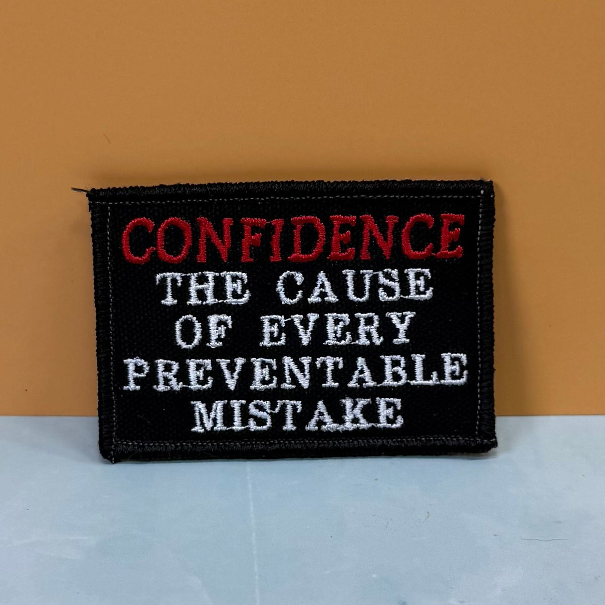 Confidence Causes Mistakes Funny Morale Patch, 2x3" | Made in USA | VELCRO® Brand Hook Backing