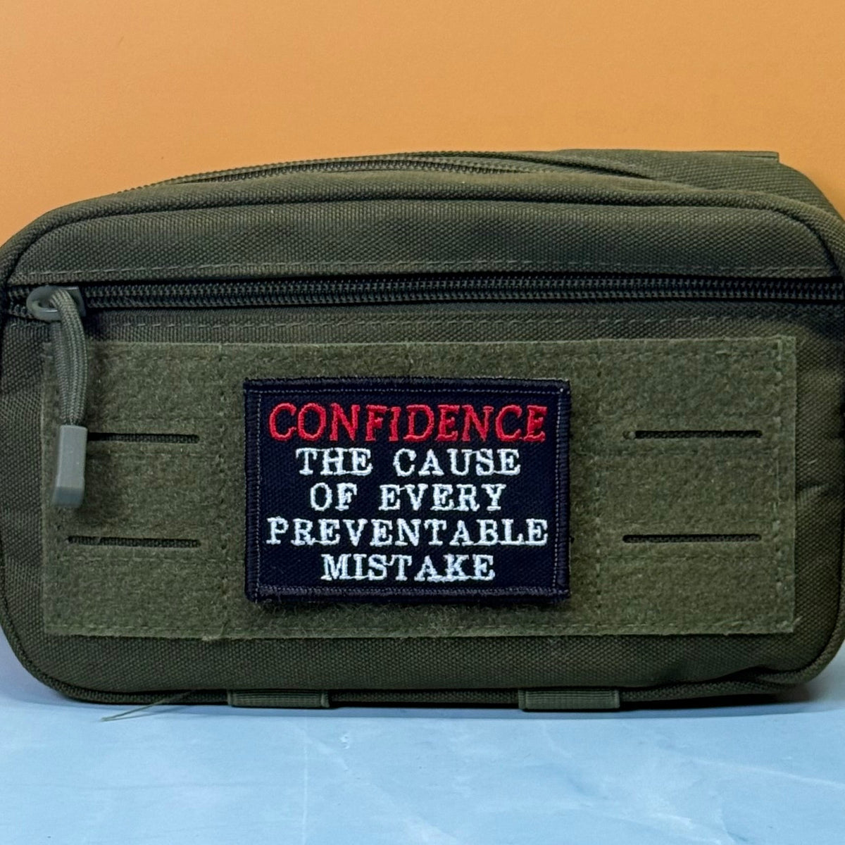 Confidence Causes Mistakes Funny Morale Patch, 2x3" | Made in USA | VELCRO® Brand Hook Backing