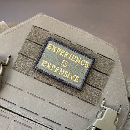 Experience Is Expensive Funny Tactical Morale Patch, 2x3" | Made in USA | VELCRO® Brand Hook Backing