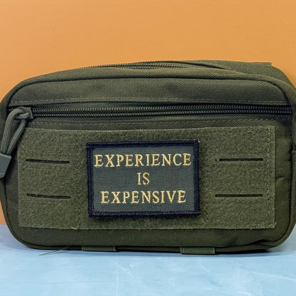 Experience Is Expensive Funny Tactical Morale Patch, 2x3" | Made in USA | VELCRO® Brand Hook Backing