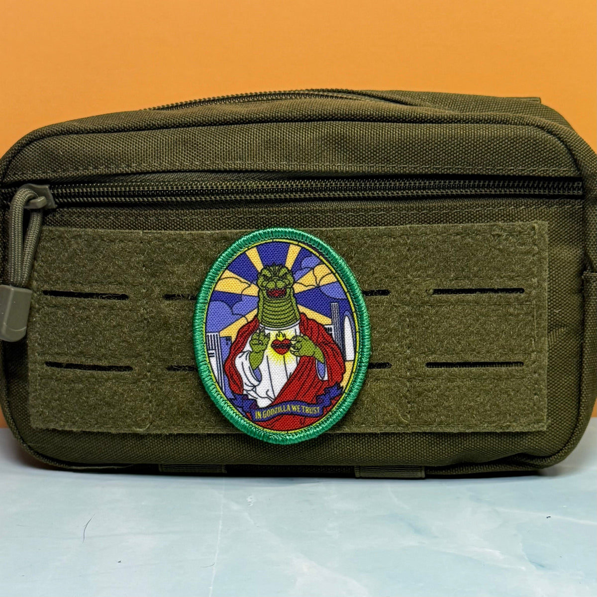 Saint Zilla, In Godzilla We Trust Funny Morale Patch, 2.5x3" | Made in USA | VELCRO® Brand Hook Backing