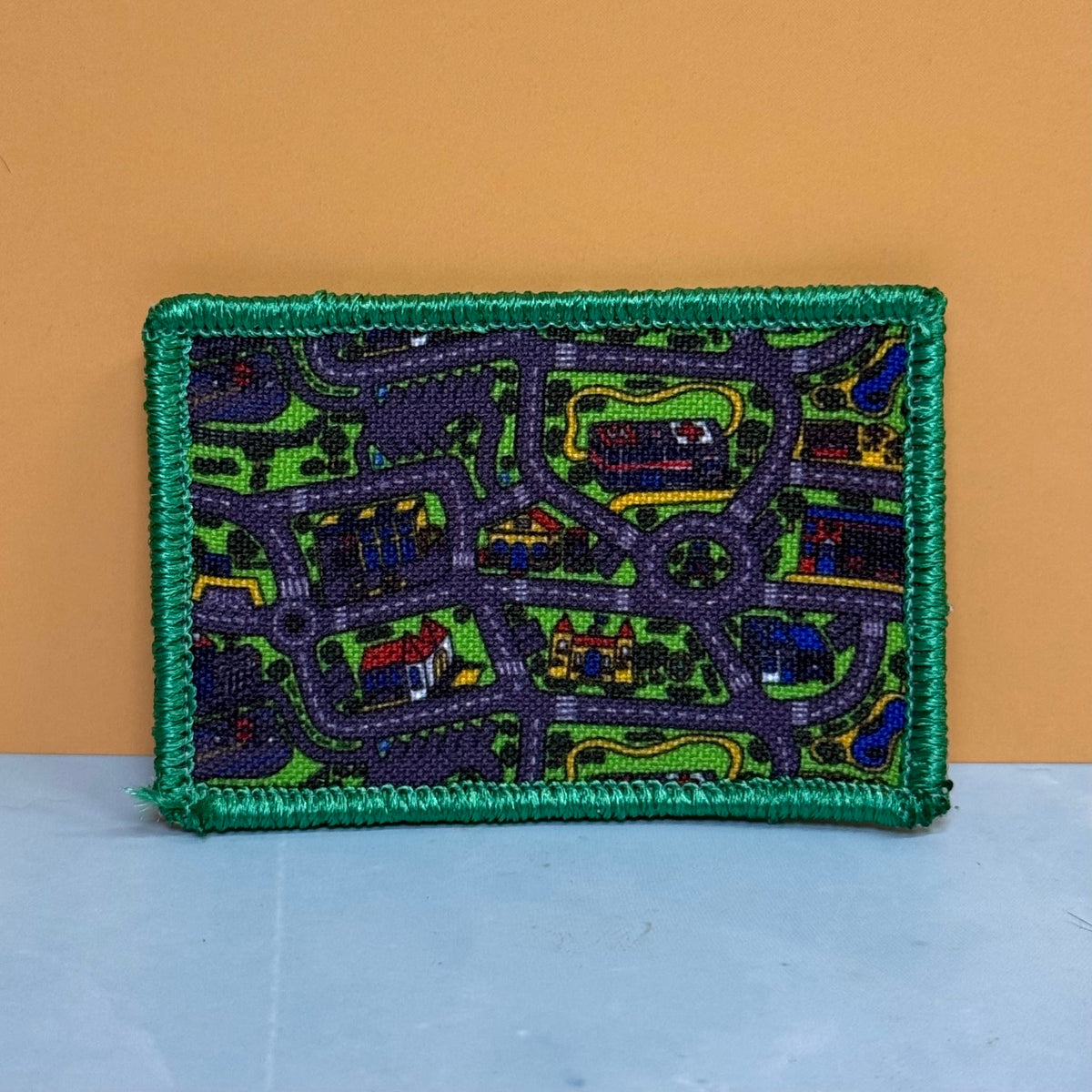 Retro Toy Car Pay Rug Carpet Funny Morale Patch, 2x3" | Made in USA | VELCRO® Brand Hook Backing
