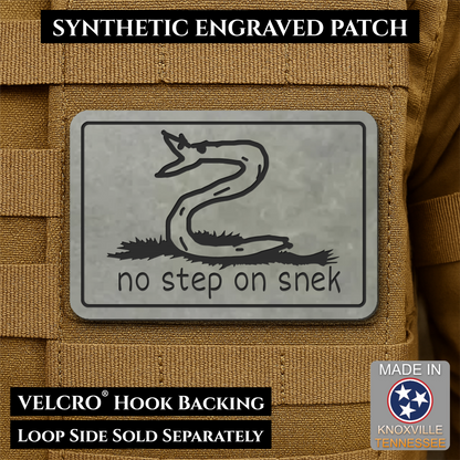 Front design and hook backing of No Step On Snek patch in flint gray