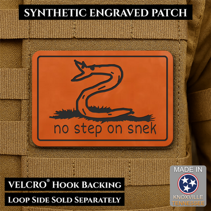 Front design and hook backing of No Step On Snek patch in orange
