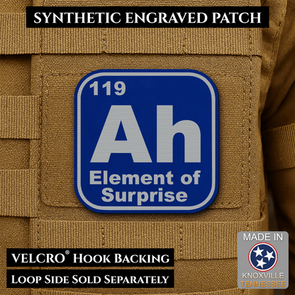 Front design and hook backing of Ah, The Element of Surprise patch in blue / silver