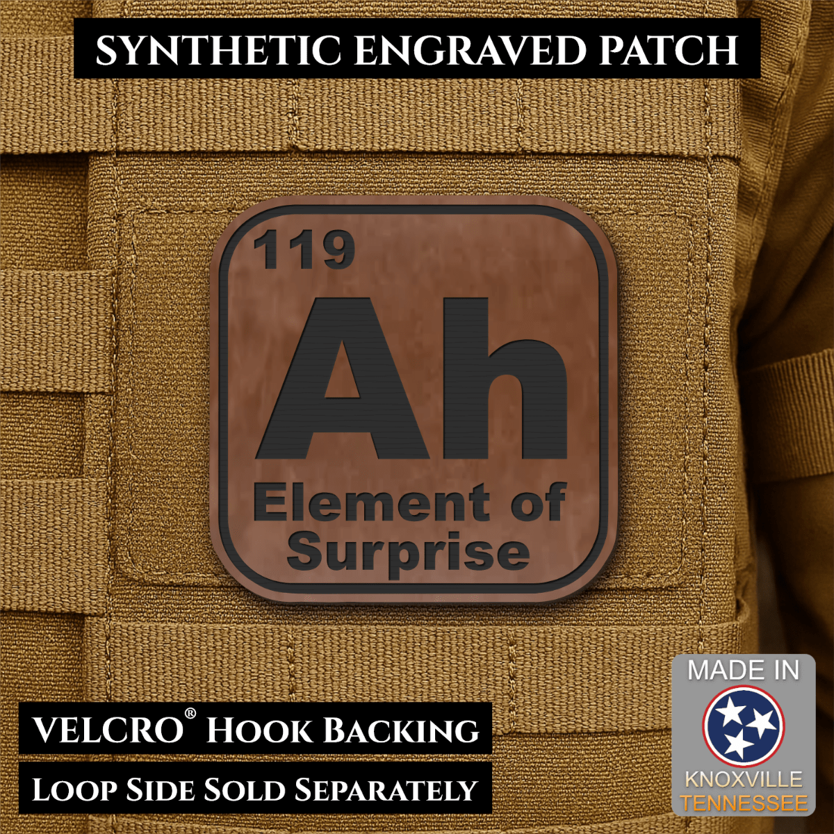 Front design and hook backing of Ah, The Element of Surprise patch in walnut faux leather