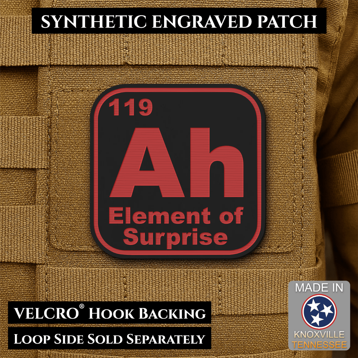 Front design and hook backing of Ah, The Element of Surprise patch in black / red