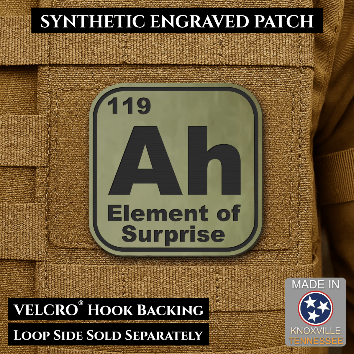 Front design and hook backing of Ah, The Element of Surprise patch in olive green