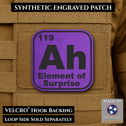 Front design and hook backing of Ah, The Element of Surprise patch in purple