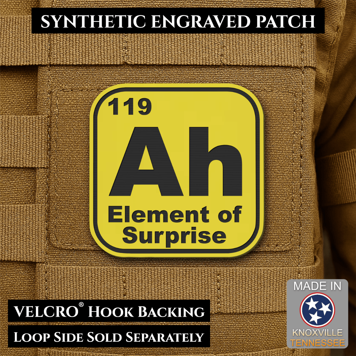 Front design and hook backing of Ah, The Element of Surprise patch in yellow