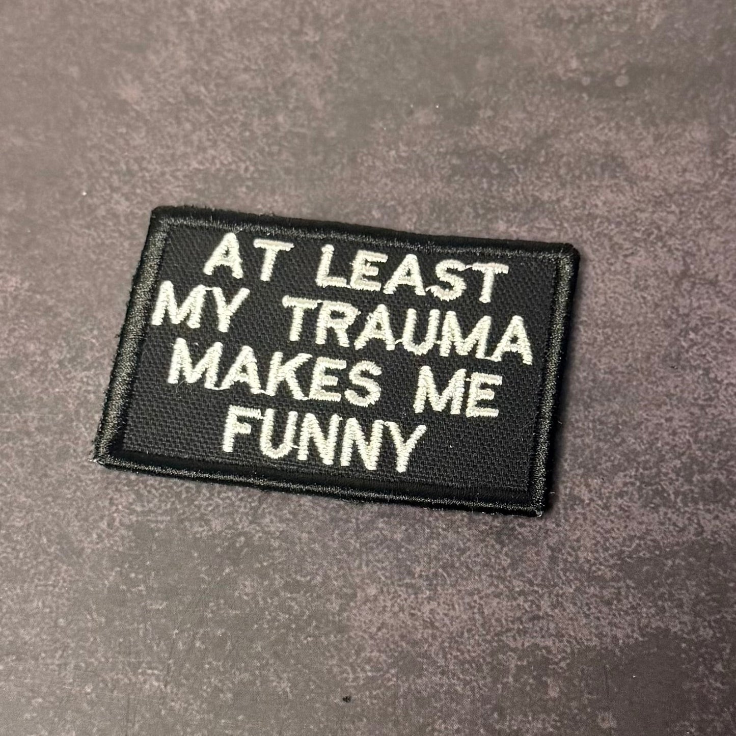 At Least My Trauma Makes Me Funny Morale Patch, 2x3" | Made in USA | VELCRO® Brand Hook Backing - LoneStar Adhesive