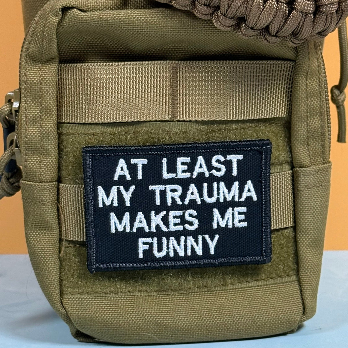 At Least My Trauma Makes Me Funny Morale Patch, 2x3" | Made in USA | VELCRO® Brand Hook Backing - LoneStar Adhesive