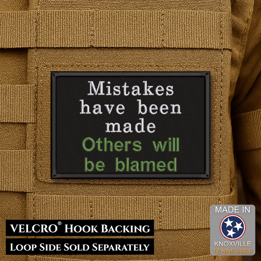 Front design and hook backing of Blame Others For Your Mistakes patch in black with white and green lettering