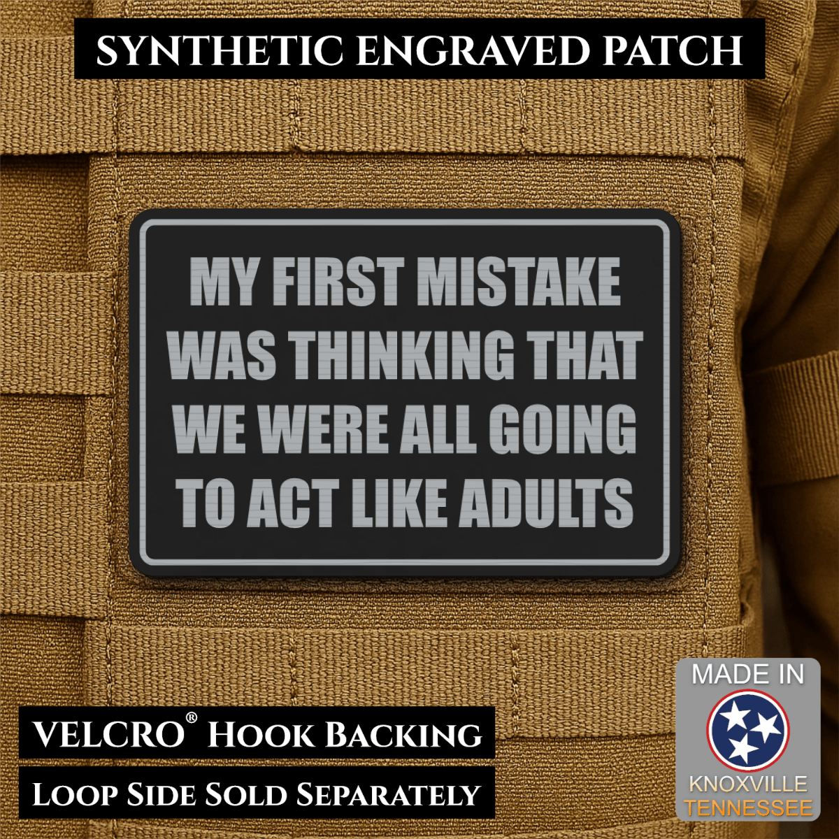 Front design and hook backing of Can We Act Like Adults patch in black / silver