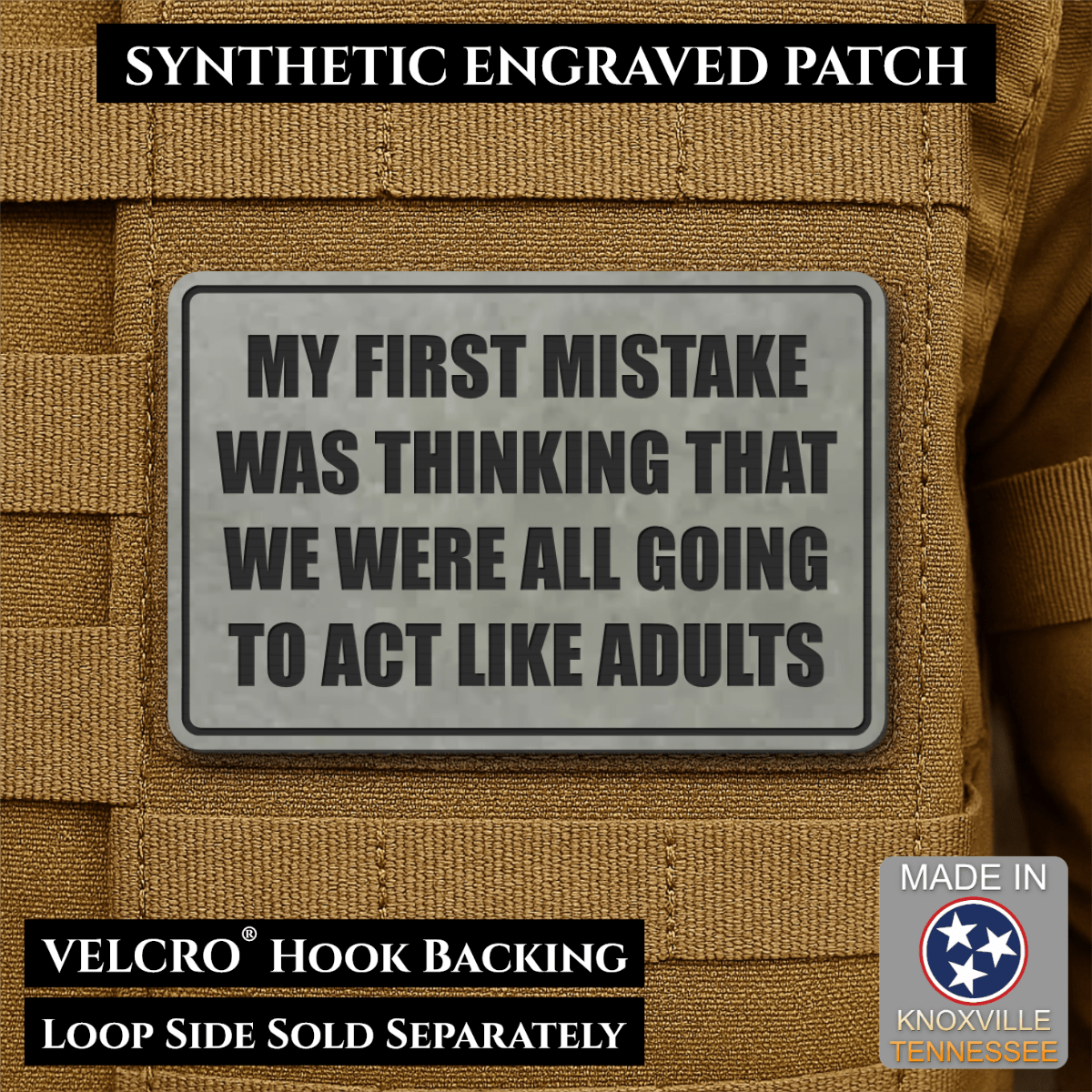 Front design and hook backing of Can We Act Like Adults patch in flint gray