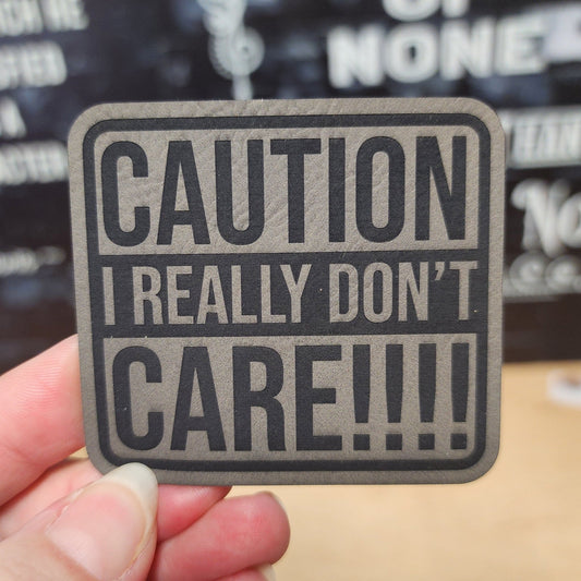 Caution I Don't Care (Grey) Engraved Leatherette Hat Patch - MR01 - LoneStar Adhesive