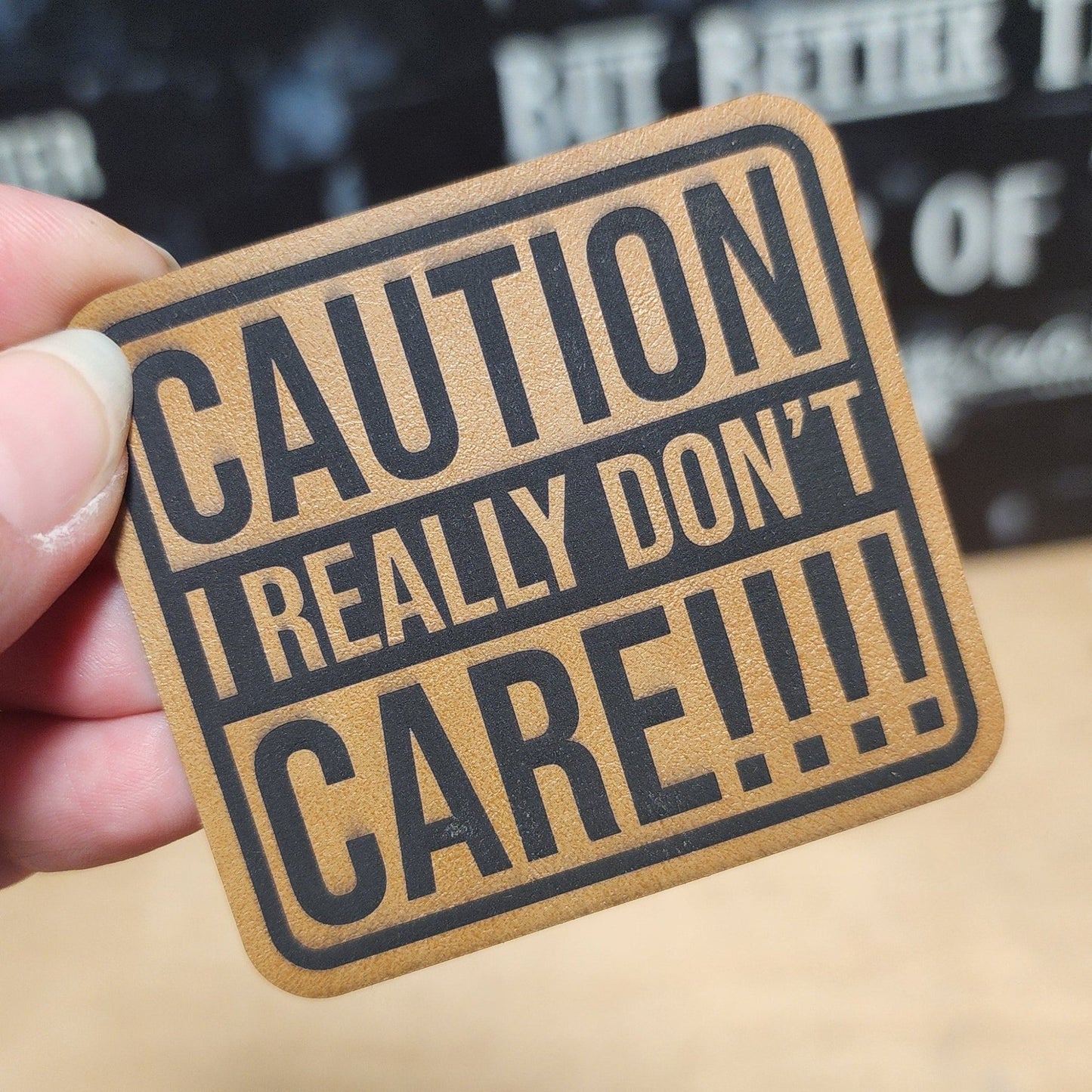 Caution: I Don't Care (Saddle Tan) Engraved Leatherette Hat Patch - MR01 - LoneStar Adhesive