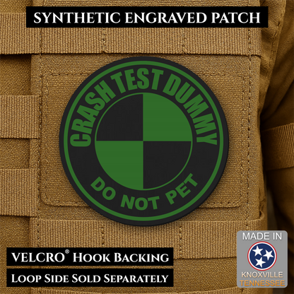 Front design and hook backing of Crash Test Dummy patch in black / green