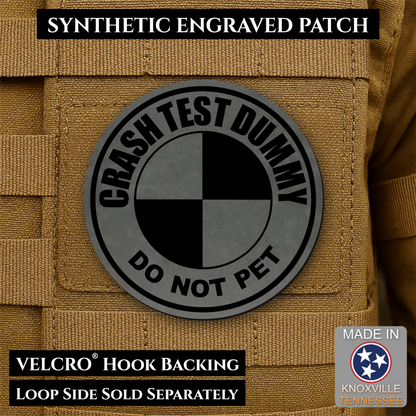 Front design and hook backing of Crash Test Dummy patch in charcoal gray