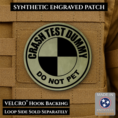 Front design and hook backing of Crash Test Dummy patch in olive green