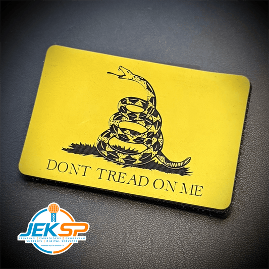 Front view of Don’t Tread on Me Gadsden Tactical Flag patch in yellow with a black coiled rattlesnake and lettering