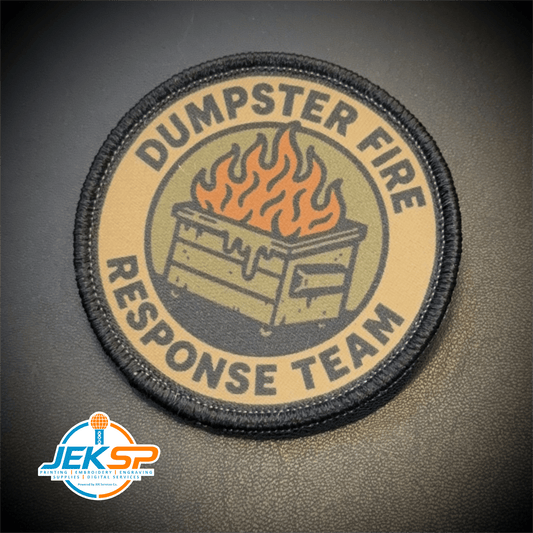 Front view of Dumpster Fire Response Team patch in tan and black with an orange flaming dumpster