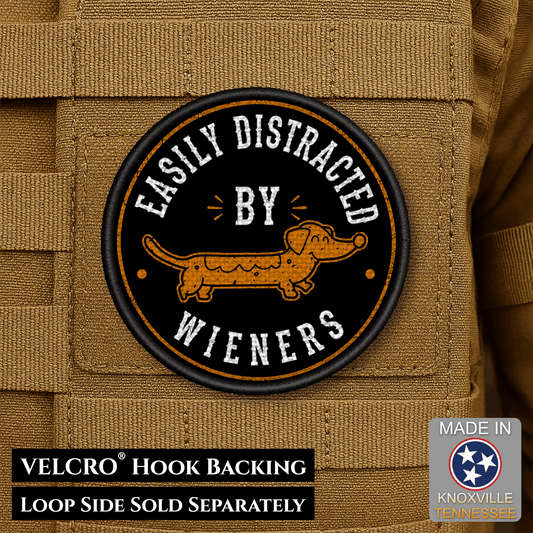 Front design and hook backing of Easily Distracted By Wieners, Dachshund patch in black with white circular lettering and a tan dachshund