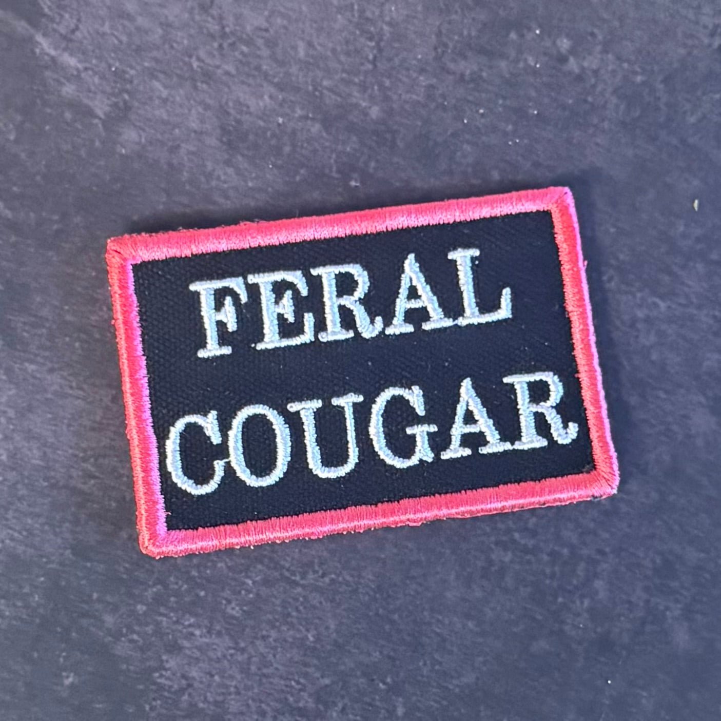 Feral Cougar Funny Morale Patch, 2x3" | Made in USA | VELCRO® Brand Hook Backing - LoneStar Adhesive