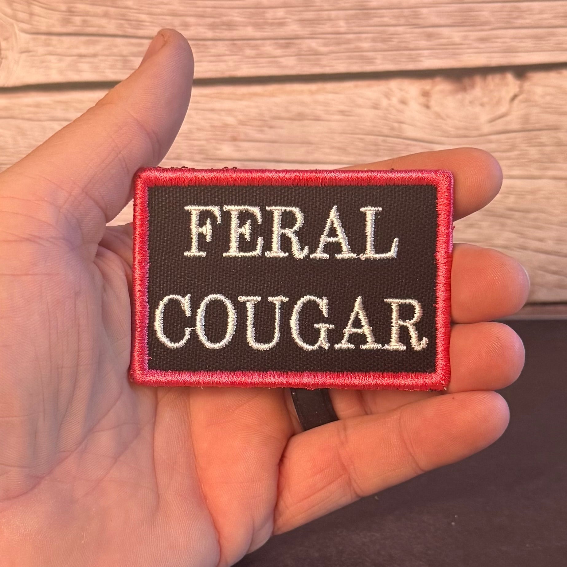 Feral Cougar Funny Morale Patch, 2x3" | Made in USA | VELCRO® Brand Hook Backing - LoneStar Adhesive