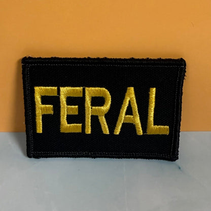 Feral & Wild Funny Morale Patch, 2x3" | Made in USA | VELCRO® Brand Hook Backing - LoneStar Adhesive