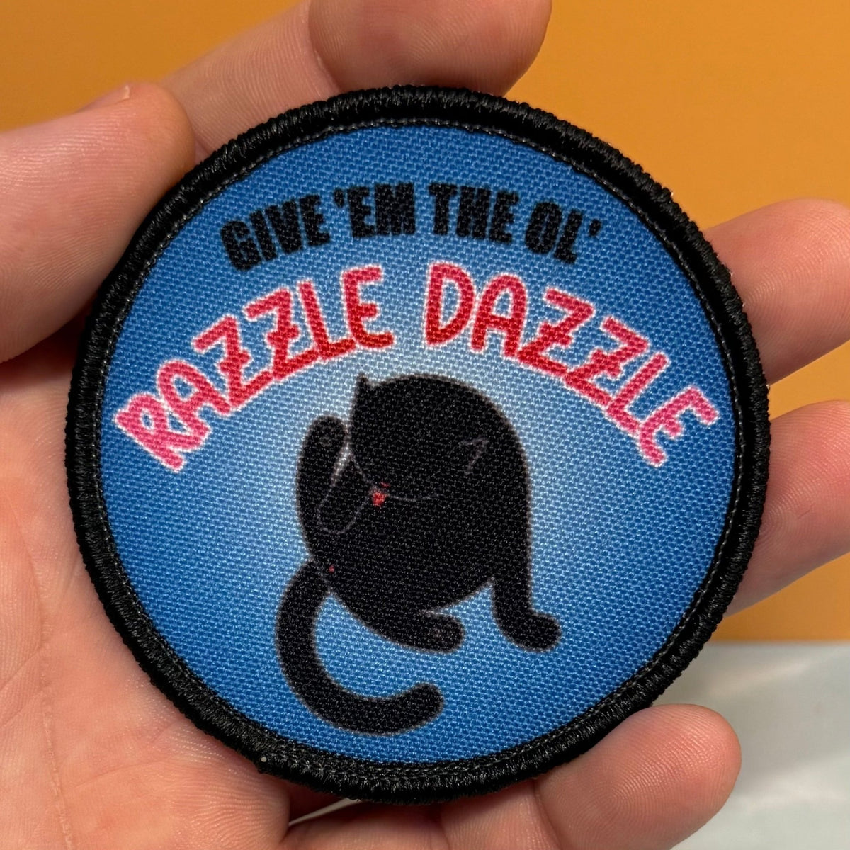 Give 'Em The Razzle Dazzle Funny Printed Morale Patch, 3" Round | VELCRO® Brand Hook Backing - #LoneStar Adhesive#