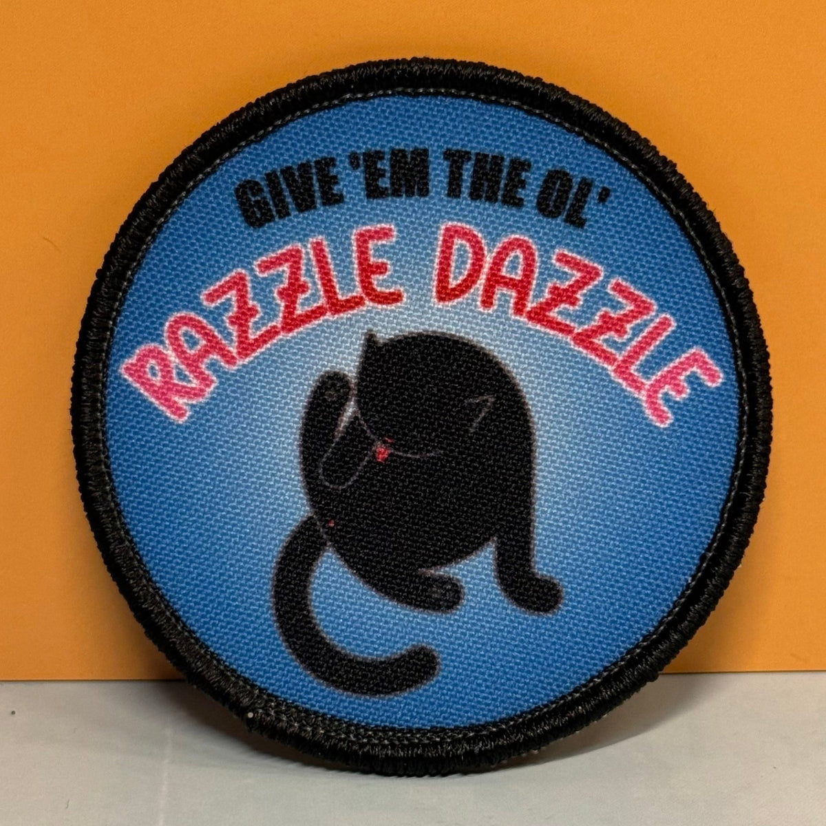 Give 'Em The Razzle Dazzle Funny Printed Morale Patch, 3" Round | VELCRO® Brand Hook Backing - #LoneStar Adhesive#