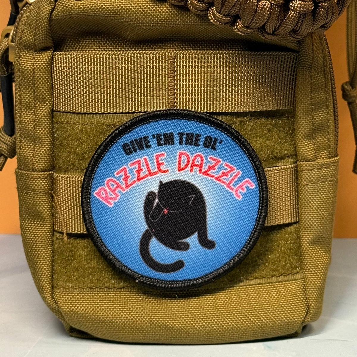 Give 'Em The Razzle Dazzle Funny Printed Morale Patch, 3" Round | VELCRO® Brand Hook Backing - #LoneStar Adhesive#