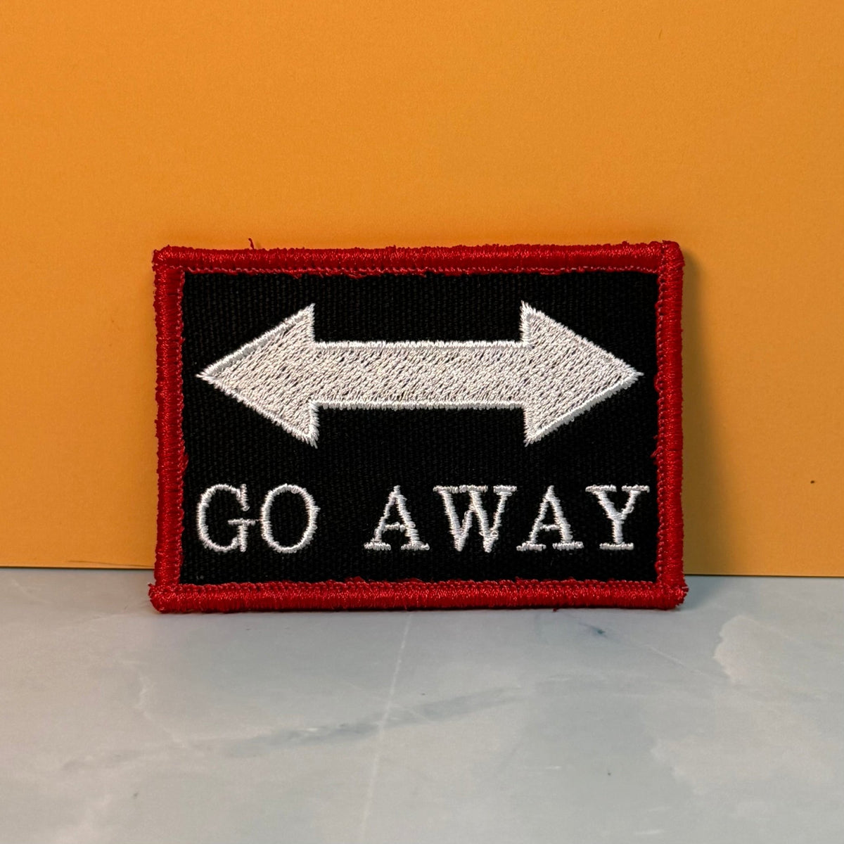 Go Away Funny Morale Patch, 2x3" | Made in USA | VELCRO® Brand Hook Backing - LoneStar Adhesive