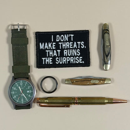 I Don't Make Threats, That Ruins The Surprise Funny Morale Patch, 2x3" | Made in USA | VELCRO® Brand Hook Backing - LoneStar Adhesive