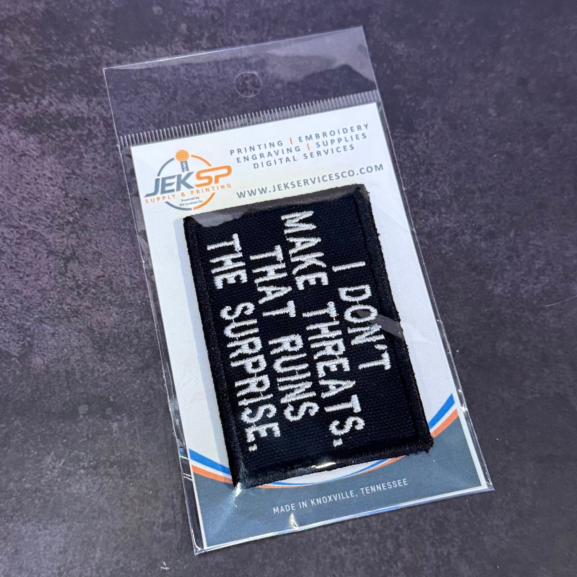 I Don't Make Threats, That Ruins The Surprise Funny Morale Patch | Made in USA | VELCRO® Brand Hook Backing - LoneStar Adhesive