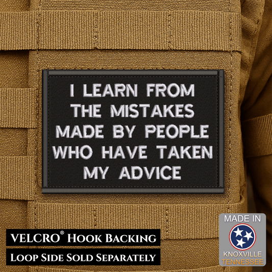 Front design and hook backing of I Learn From Mistakes Made patch in black with white lettering