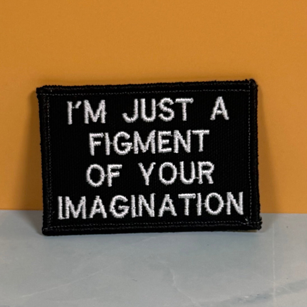 I'm Just A Figment Of Your Imagination Funny Morale Patch, 2x3" | Made in USA | VELCRO® Brand Hook Backing - LoneStar Adhesive