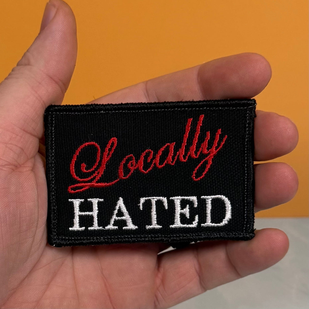 Locally Hated Funny Morale Patch, 2x3" | Made in USA | VELCRO® Brand Hook Backing - LoneStar Adhesive
